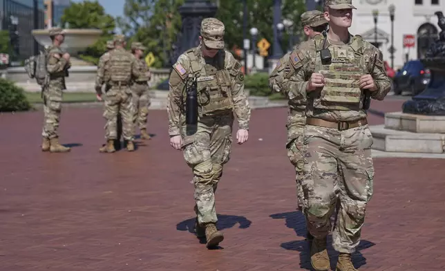 Members of the Louisiana National Guard patrol Union Station, Monday, Aug. 25, 2025, in Washington. (AP Photo/Mariam Zuhaib)