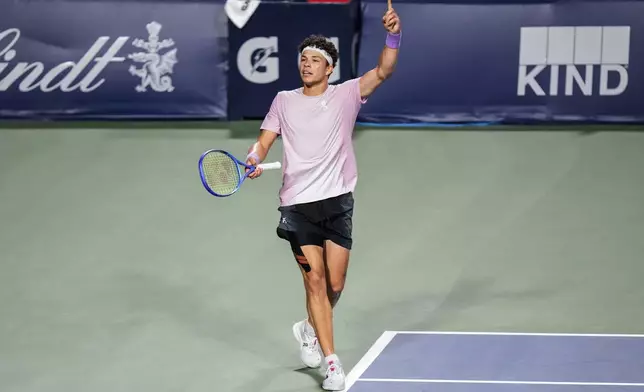 Ben Shelton, of the United States, celebrates after winning the second set against Karen Khachanov, of Russia, during the men's final at the National Bank Open tennis tournament in Toronto, Thursday, Aug. 7, 2025. (Chris Young/The Canadian Press via AP)
