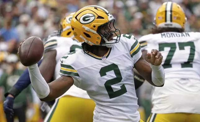 Green Bay Packers' Malik Willis throws during the first half of a preseason NFL football game against the Seattle Seahawks Saturday, Aug. 23, 2025, in Green Bay, Wis. (AP Photo/Matt Ludtke)