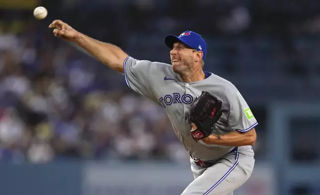 Toronto Blue Jays starting pitcher Max Scherzer throws to the plate during the second inning of a baseball game against the Los Angeles Dodgers, Friday, Aug. 8, 2025, in Los Angeles. (AP Photo/Mark J. Terrill)