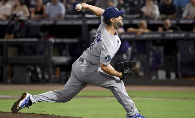 Los Angeles Dodgers pitcher Clayton Kershaw throws during the second inning of a baseball game against the Tampa Bay Rays Friday, Aug. 1, 2025, in Tampa, Fla. (AP Photo/Jason Behnken)