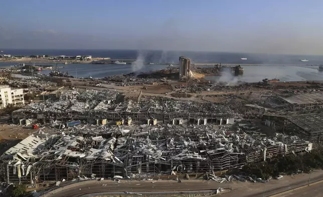 FILE - This photo shows a general view of the scene of an explosion that hit the seaport of Beirut, Lebanon, Wednesday, Aug. 5, 2020. (AP Photo/Bilal Hussein, File)