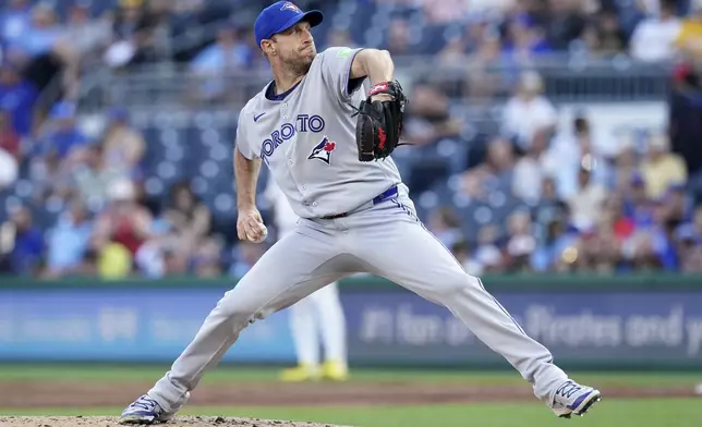 Toronto Blue Jays pitcher Max Scherzer delivers during the first inning of a baseball game against the Pittsburgh Pirates Tuesday, Aug. 19, 2025, in Pittsburgh. (AP Photo/Matt Freed)