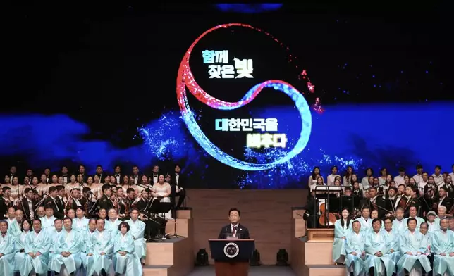 South Korean President Lee Jae Myung speaks during a ceremony to celebrate the 80th anniversary of Korea's liberation from Japanese colonial rule in Seoul, South Korea, Friday, Aug. 15, 2025. (AP Photo/Ahn Young-joon, Pool)