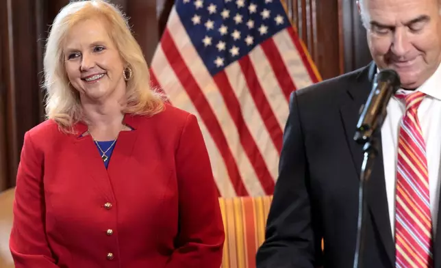 Catherine Hanaway reacts as Gov. Mike Kehoe announces her as the next Missouri Attorney General on Tuesday, Aug. 19, 2025, during a press conference in his office at the Capitol in Jefferson City. (Laurie Skrivan/St. Louis Post-Dispatch via AP)