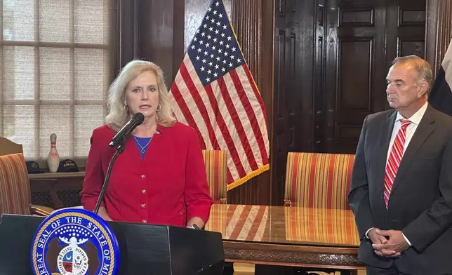 Former U.S. Attorney Catherine Hanaway speaks to reporters after Missouri Gov. Mike Kehoe announced her appointment as the state's next attorney general on Tuesday, Aug. 19, 2025, at the governor's Capitol office in Jefferson City, Mo. (AP Photo/David A. Lieb)