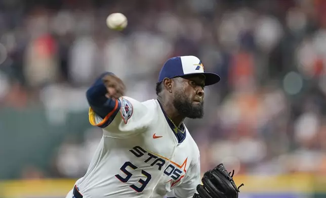 Houston Astros starting pitcher Cristian Javier throws against the Boston Red Sox during the first inning of a baseball game Monday, Aug. 11, 2025, in Houston. (AP Photo/David J. Phillip)