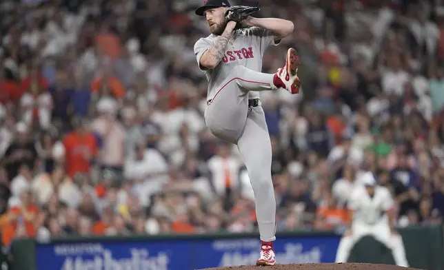 Boston Red Sox starting pitcher Garrett Crochet throws against the Houston Astros during the first inning of a baseball game Monday, Aug. 11, 2025, in Houston. (AP Photo/David J. Phillip)