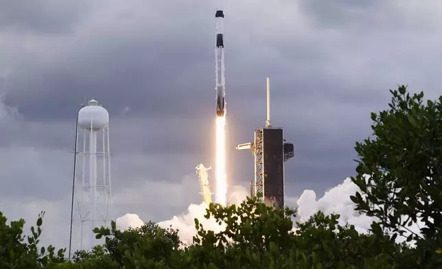 A SpaceX Falcon 9 rocket with a Crew Dragon capsule lifts off from Pad 39-A at the Kennedy Space Center, Friday, Aug. 1, 2025, in Cape Canaveral, Fla. (AP Photo/John Raoux)