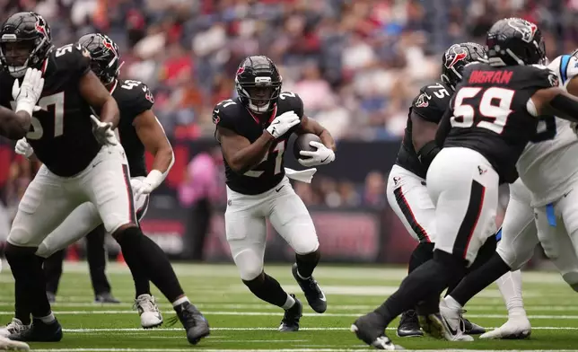 Houston Texans running back Nick Chubb runs against the Carolina Panthers during the first half of an NFL preseason football game on Saturday, Aug. 16, 2025, in Houston. (AP Photo/Ashley Landis)