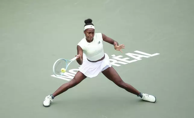 Coco Gauff, of the United States, returns a shot during third-round match action against Veronika Kudermetova at the National Bank Open women's tennis tournament in Montreal, Thursday, July 31, 2025. (Christopher Katsarov/The Canadian Press via AP)