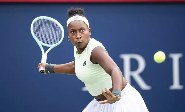 Coco Gauff, of the United States, returns a shot during third-round match action against Veronika Kudermetova at the National Bank Open women's tennis tournament in Montreal, Thursday, July 31, 2025. (Christopher Katsarov/The Canadian Press via AP)