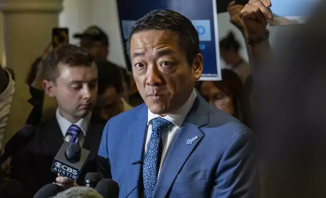 Texas state Rep. Gene Wu speaks to media outside the house chambers at the Texas Capitol in Austin, Texas, Monday, Aug. 18, 2025. (AP Photo/Stephen Spillman)
