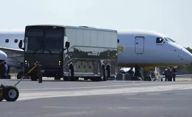 Texas Democratic lawmakers return to Texas after leaving two weeks ago to block a vote on a redrawn redistricting map, Monday, Aug. 18, 2025, in Austin, Texas. (AP Photo/Eric Gay)