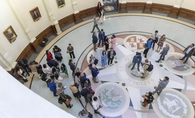 Texas democrats return at the Texas Capitol in Austin, Texas, Monday, Aug. 18, 2025. (AP Photo/Stephen Spillman)
