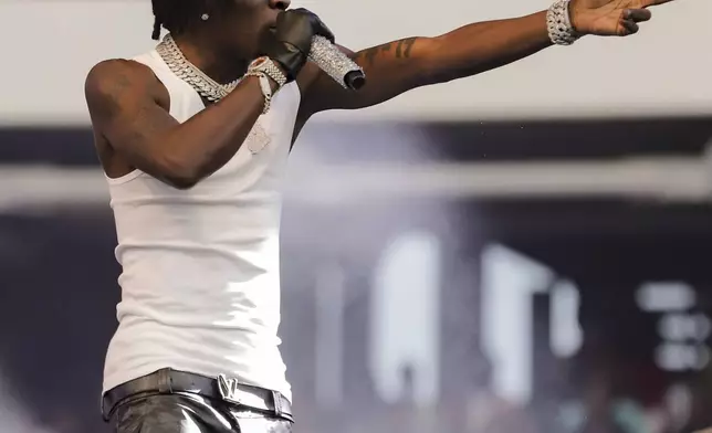 Ghanaian dancehall artist Charles Nii Armah Mensah, known by his stage name Shatta Wale, performs in Accra, Ghana, Sunday, July 6, 2025. (AP Photo/Peniel Brago Amoakohene)
