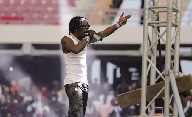 Ghanaian dancehall artist Charles Nii Armah Mensah, known by his stage name Shatta Wale, performs in Accra, Ghana, Sunday, July 6, 2025. (AP Photo/Peniel Brago Amoakohene)