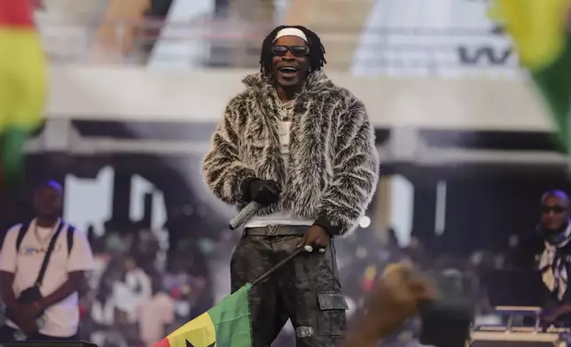 Ghanaian dancehall artist Charles Nii Armah Mensah, known by his stage name Shatta Wale, performs in Accra, Ghana, Sunday, July 6, 2025. (AP Photo/Peniel Brago Amoakohene)