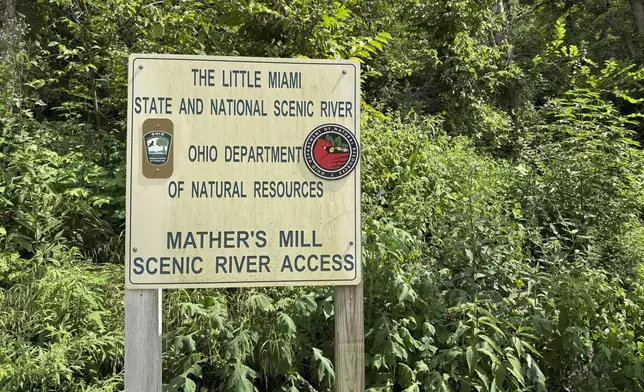 A sign for the Ohio Department of Natural Resources is seen along the Little Miami River, Thursday, Aug. 7, 2025, in Oregonia, Ohio. (AP Photo/Patrick Aftoora-Orsagos)