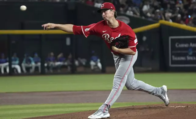 Cincinnati Reds pitcher Brady Singer throws against the Cincinnati Reds in the first inning of a baseball game, Sunday, Aug 24, 2025, in Phoenix. (AP Photo/Rick Scuteri)