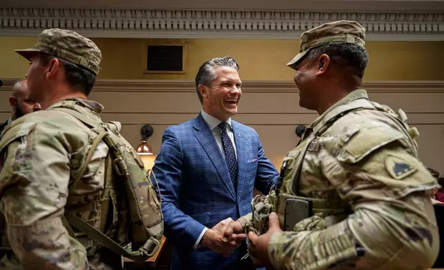 Defense Secretary Pete Hegseth meet with members of the National Guard at Union Station in Washington, Wednesday, Aug. 20, 2025. (Alexander Drago/Pool via AP)