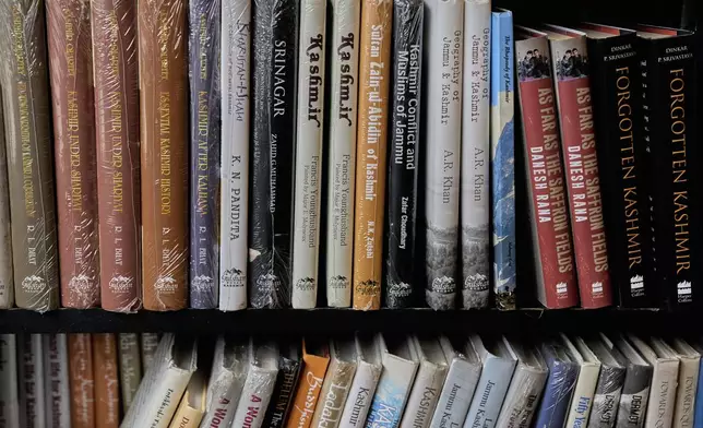 Books on Kashmir are displayed inside a book store in Srinagar, India, Thursday, Aug. 7, 2025. (AP Photo/ Dar Yasin )