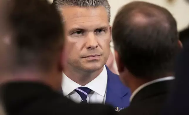 Defense Secretary Pete Hegseth attends an event to mark National Purple Heart Day in the East Room of the White House, Thursday, Aug. 7, 2025, in Washington. (AP Photo/Mark Schiefelbein)