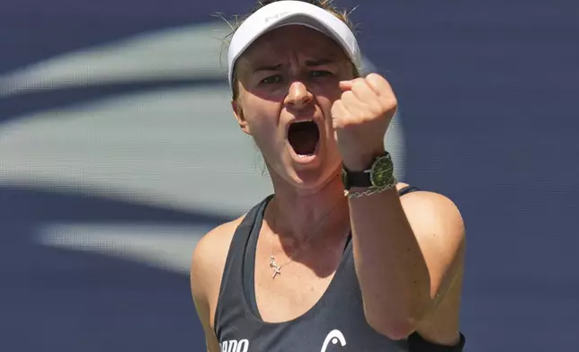 Barbora Krejcikova, of the Czech Republic, reacts after defeating Victoria Mboko, of Canada, during the first round of the US Open tennis championships, Monday, Aug. 25, 2025, in New York. (AP Photo/Kirsty Wigglesworth)