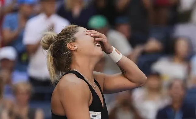Renata Zarazua, of Mexico, reacts after defeating Madison Keys, of the United States, during the first round of the US Open tennis championships, Monday, Aug. 25, 2025, in New York. (AP Photo/Seth Wenig)