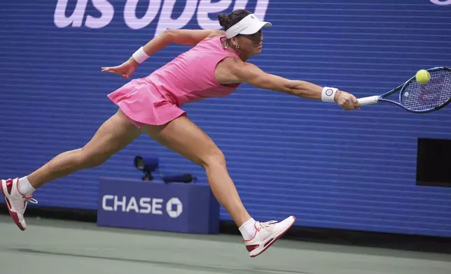 Ajla Tomljanovic, of Australia, returns a shot to Coco Gauff, of the United States, during the first round of the U.S. Open tennis championships, Tuesday, Aug. 26, 2025, in New York. (AP Photo/Frank Franklin II)