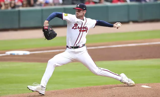 Atlanta Braves pitcher Joey Wentz delivers in the first inning of a baseball game against the Miami Marlins, Sunday, Aug. 10, 2025, in Atlanta. (AP Photo/Colin Hubbard)