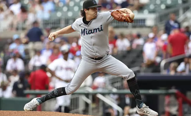 Miami Marlins pitcher Cal Quantrill delivers in the third inning of a baseball game against the Atlanta Braves, Sunday, Aug. 10, 2025, in Atlanta. (AP Photo/Colin Hubbard)