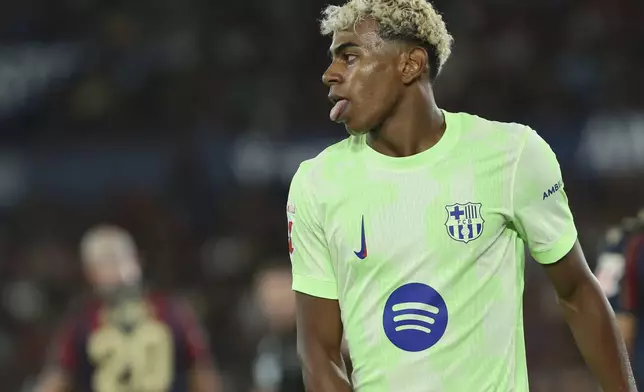 Barcelona's Lamine Yamal reacts during the La Liga soccer match between Levante and Barcelon in Valencia, Spain, Saturday, Aug. 23, 2025. ((AP Photo/Alberto Saiz)