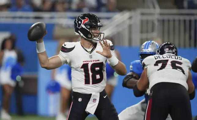 Houston Texans quarterback Graham Mertz (18) throws a pass against the Detroit Lions during the first half of an NFL football game Saturday, Aug. 23, 2025, in Detroit. (AP Photo/Paul Sancya)