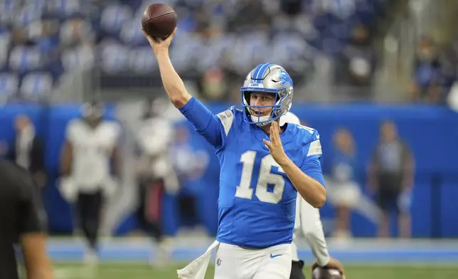 Detroit Lions quarterback Jared Goff warms up before a preseason NFL football game against the Houston Texans Saturday, Aug. 23, 2025, in Detroit. (AP Photo/Ryan Sun)