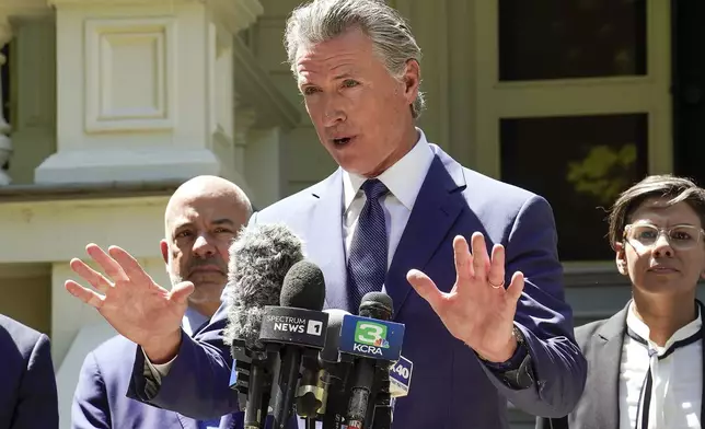 California Gov. Gavin Newsom calls for a new way for California to redraw it's voting districts during a news conference In Sacramento, Calif., Friday July 25, 2025. (AP Photo/Rich Pedroncelli)