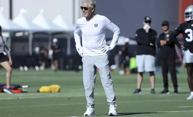 Las Vegas Raiders head coach Pete Carroll watches his team practice during the team's NFL football training camp Wednesday, July 23, 2025, in Henderson, Nev.