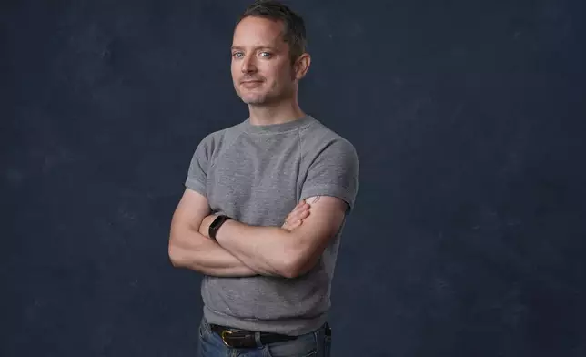 FILE - Elijah Wood poses for a portrait to promote "The Toxic Avenger" during Comic-Con International on Thursday, July 24, 2025, in San Diego. (AP Photo/Chris Pizzello, File)