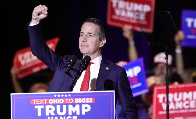 Ohio Republican Senate candidate Bernie Moreno raises his right fist during a rally for Republican vice presidential candidate Sen. JD Vance, R-Ohio, in Middletown, Ohio, July 22, 2024. (AP Photo/Paul Vernon, File)