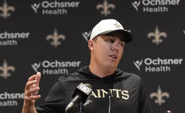 New Orleans Saints head coach Kellen Moore responds to a question during a news conference after losing to the Denver Broncos in an NFL preseason football game Saturday, Aug. 23, 2025, in New Orleans. (AP Photo/Gerald Herbert)