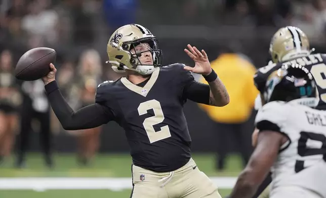 New Orleans Saints quarterback Spencer Rattler (2) throws a pass against the Jacksonville Jaguars in the second half of an NFL preseason football game in New Orleans, Sunday, Aug. 17, 2025. (AP Photo/Gerald Herbert)