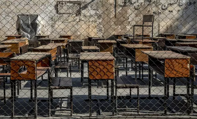 FILE - The benches of a school sit empty in Kabul, Afghanistan, on Dec. 22, 2022. (AP Photo/Ebrahim Noroozi, File)