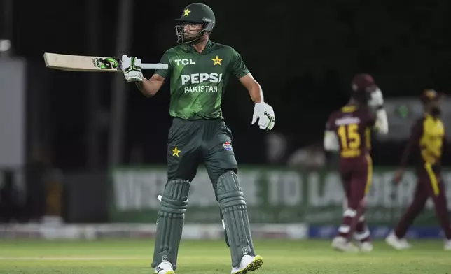 Pakistan's Hasan Nawaz reacts as he walks off the field after his dismissal during the first Twenty20 cricket match between West Indies and Pakistan, in Lauderhill, Fla., Thursday, July 31, 2025. (AP Photo/Lynne Sladky)