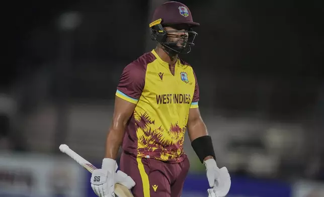 West Indies' Shai Hope walks off the field after his dismissal during the first Twenty20 cricket match between West Indies and Pakistan, in Lauderhill, Fla., Thursday, July 31, 2025. (AP Photo/Lynne Sladky)