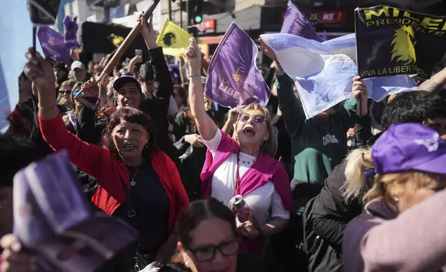 Supporters of Argentine President Javier Milei attend a campaign rally ahead of legislative provincial elections in Lomas de Zamora, Argentina, Wednesday, Aug. 27, 2025. (AP Photo/Natacha Pisarenko)