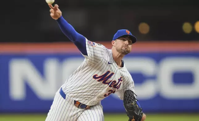 New York Mets' Clay Holmes pitches during the second inning of a baseball game against the Cleveland Guardians Tuesday, Aug. 5, 2025, in New York. (AP Photo/Frank Franklin II)