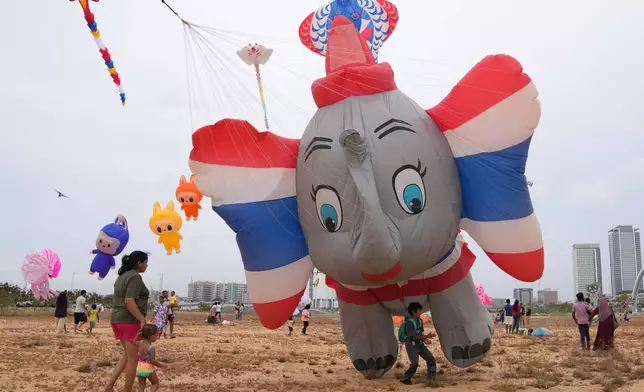 An elephant-shaped kite takes flight at the Colombo International Kite Festival in Colombo, Sri Lanka, Saturday, Aug. 23, 2025. (AP Photo/Eranga Jayawardena)