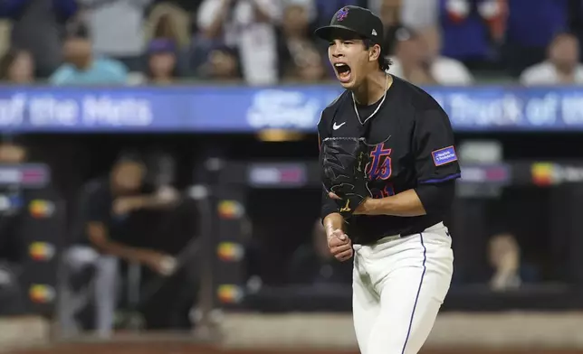 New York Mets pitcher Jonah Tong reacts after striking out Miami Marlins' Liam Hicks during the fifth inning of a baseball game Friday, Aug. 29, 2025, in New York. (AP Photo/Pamela Smith)