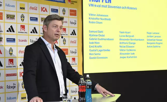 Sweden coach Jon Dahl Tomasson speaks during a news conference announcing the squad for the upcoming FIFA World Cup soccer qualifiers, Wednesday, Aug. 27, 2025. (Henrik Montgomery/TT News Agency via AP)