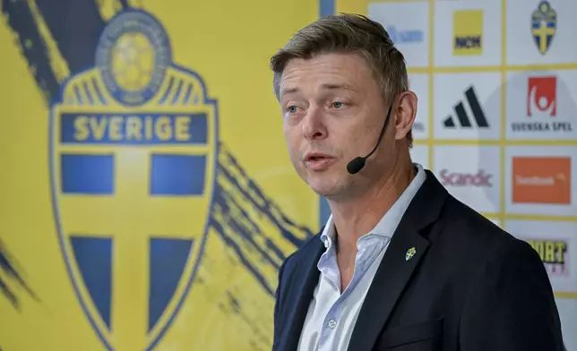 Sweden coach Jon Dahl Tomasson speaks during a news conference announcing the squad for the upcoming FIFA World Cup soccer qualifiers, Wednesday, Aug. 27, 2025. (Henrik Montgomery/TT News Agency via AP)